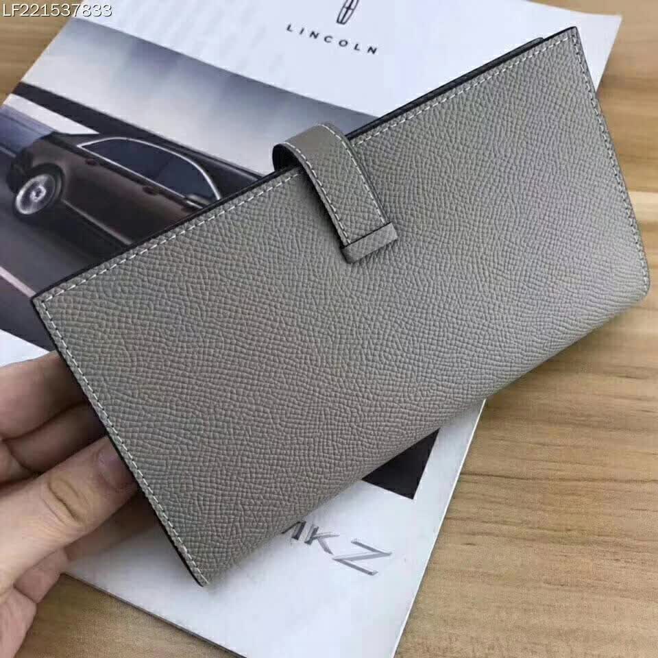 Open interior shot showing card slots of Hermes Medium Bearn Wallet