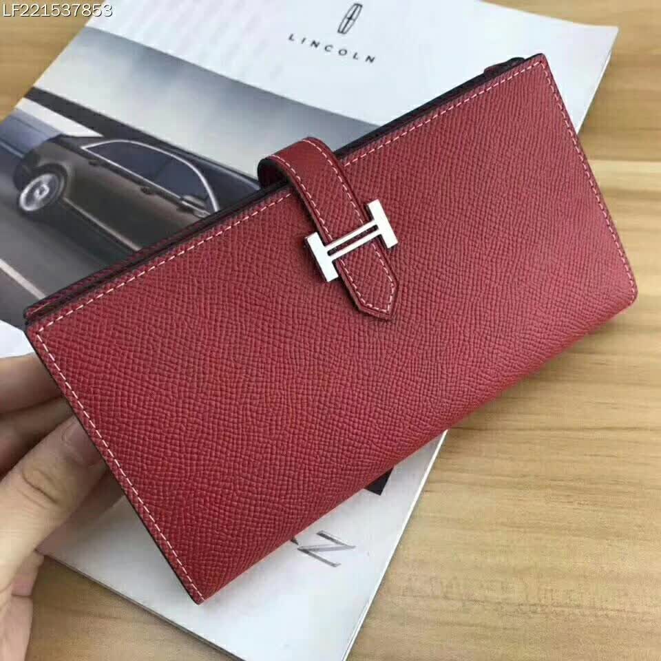 Close-up detail of fold and silver hardware on Hermes Medium Bearn Wallet