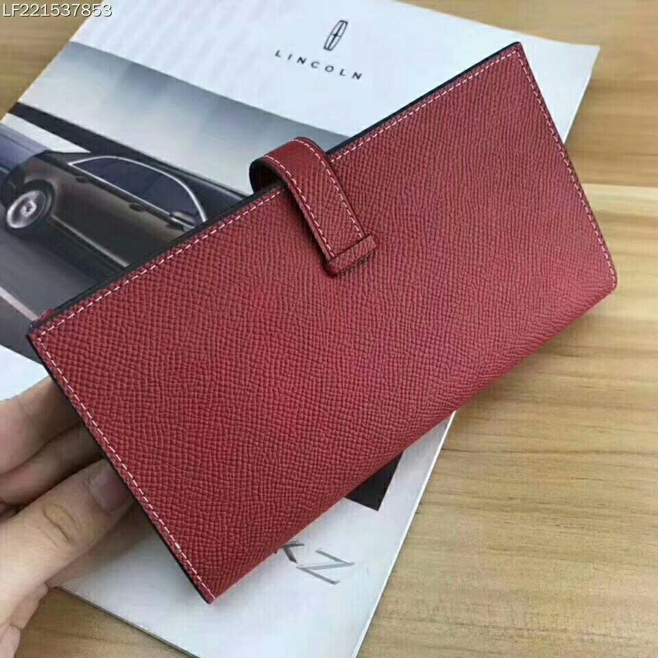 Open interior showing card slots of Hermes Medium Bearn Wallet in red