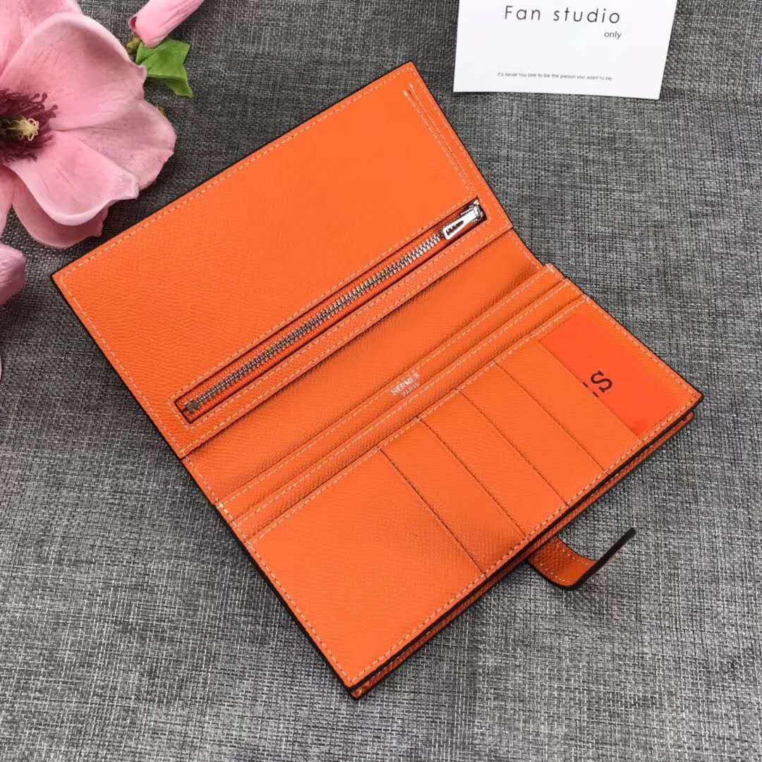 Open Hermes Medium Bearn Wallet showing interior card slots and compartments