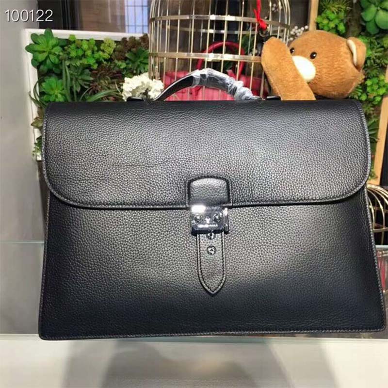 Close-up of polished hardware on Hermes Men Sac A Depeches 38 Briefcase