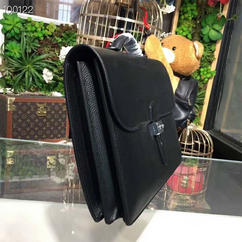 Side profile showing slim silhouette of Hermes Men Sac A Depeches 38 Briefcase