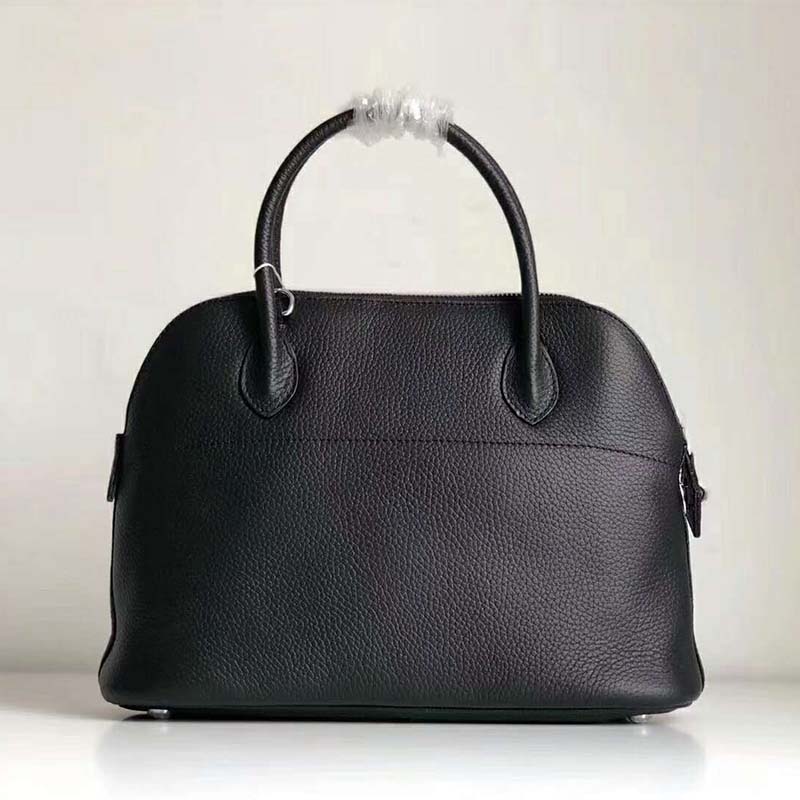Close-up on silver hardware and leather texture of Hermes Women Bolide 31 bag