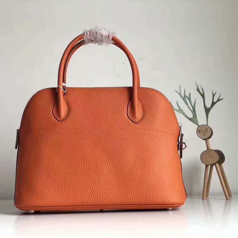 Side angle showing silhouette and strap of Hermes Bolide 31 bag