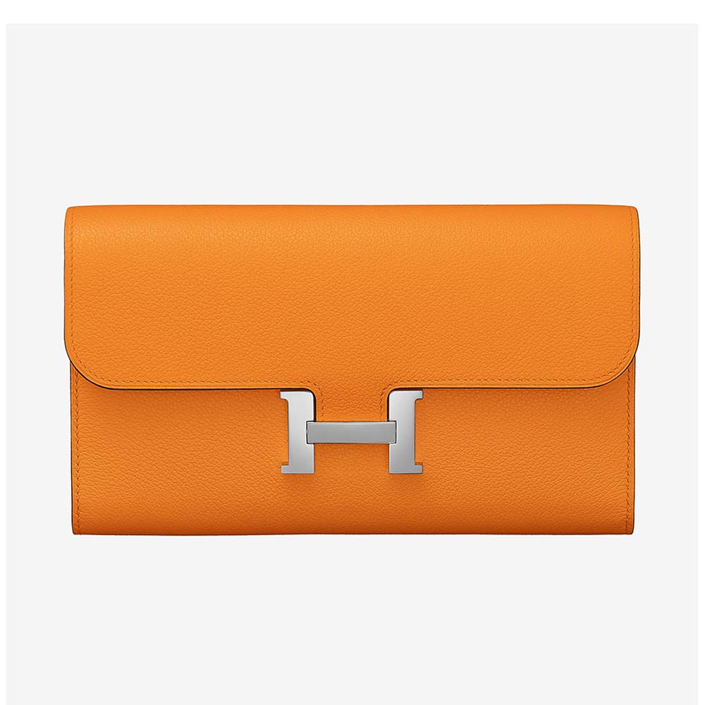 Front view of Hermes Women Constance Long Wallet in vibrant orange calfskin