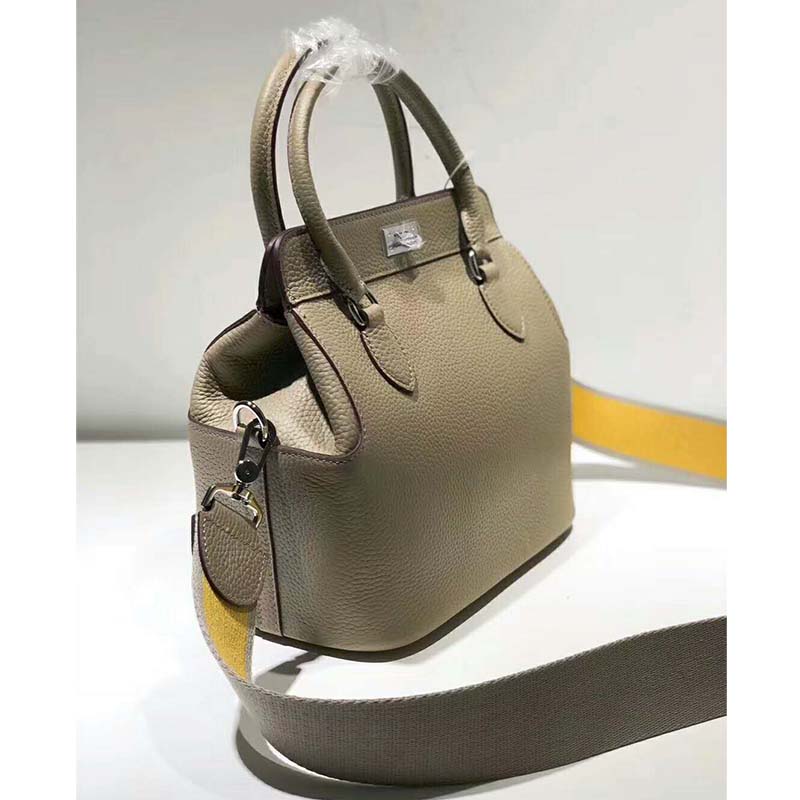 Side profile showcasing structured silhouette of Hermes Women Toolbox 26 Bag