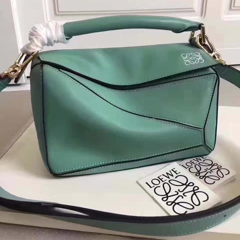 Side angle showing geometric silhouette of Loewe Puzzle Bag with Strap Handle