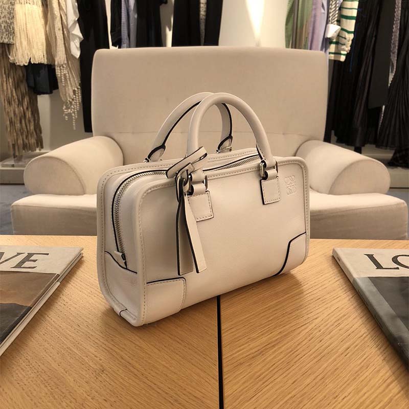 Side angle showing silhouette of Loewe Women Amazona 28 Bag Ivory