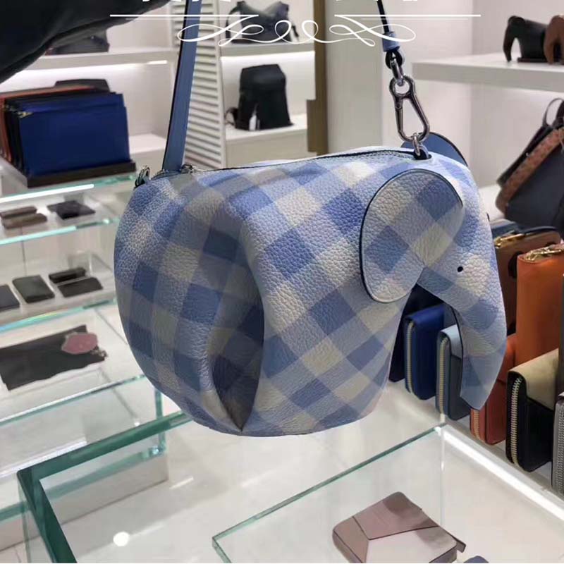 Close-up of leather elephant detail on Loewe Gingham Mini Bag