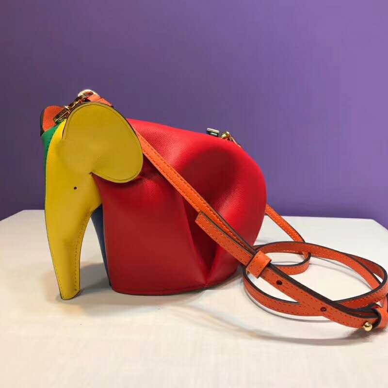 Side angle showing compact silhouette of Loewe Women Elephant Rainbow Mini Bag