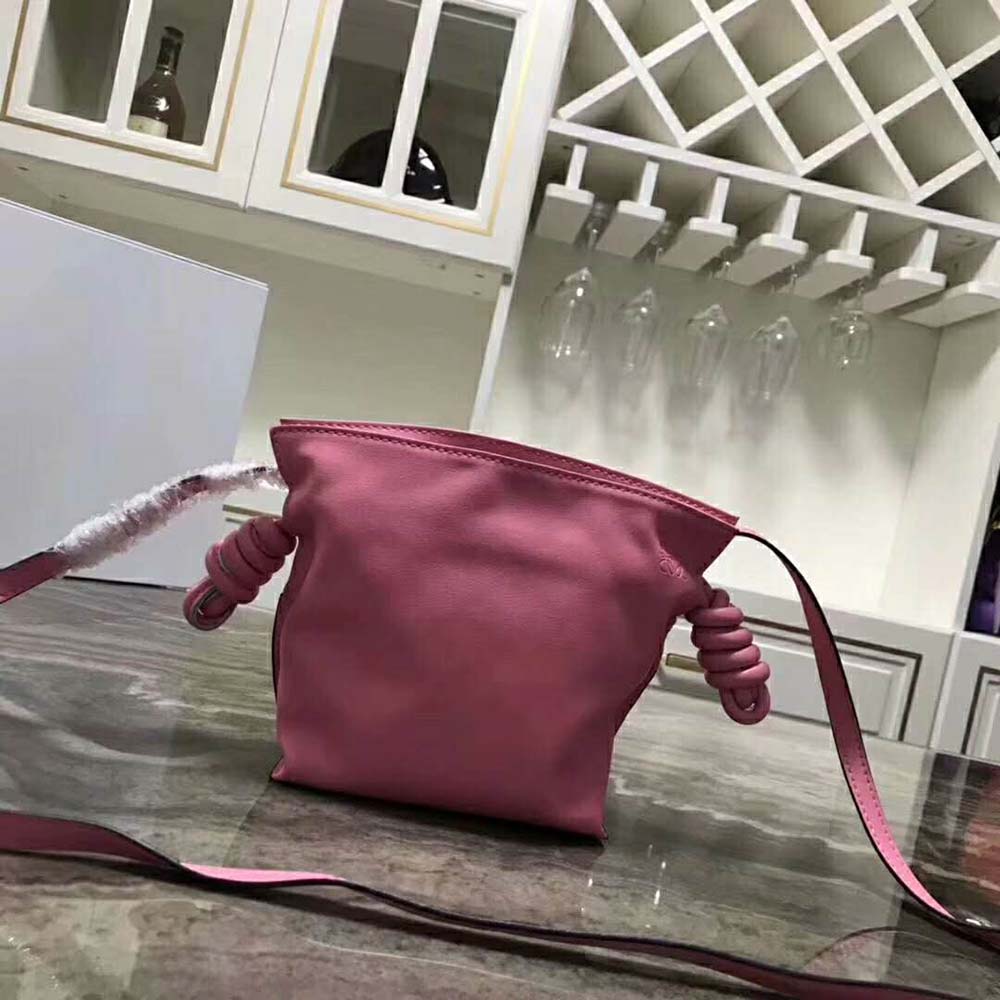 Close-up detail of gold-tone flamenco knot on Loewe Women Flamenco Knot Mini Bag