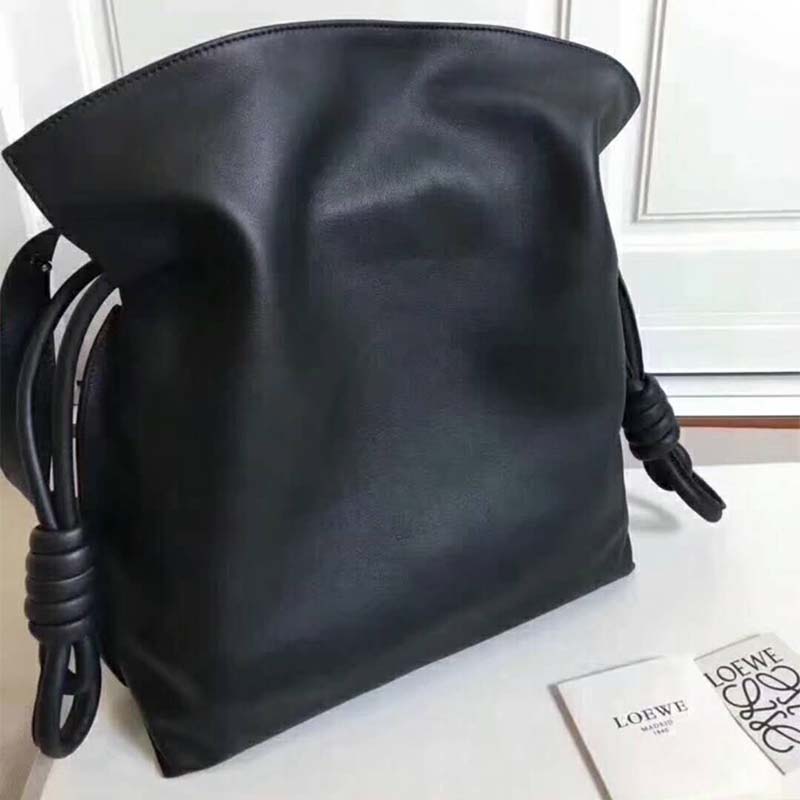 Side angle showing compact silhouette of Loewe Women Flamenco Knot Small Bag