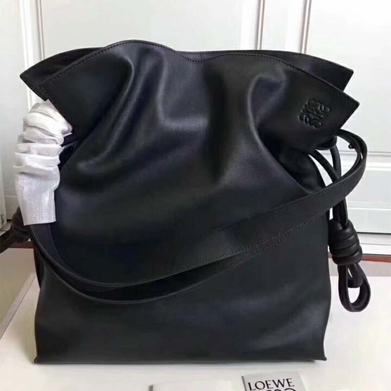 Close-up on flamenco knot hardware of Loewe Women Flamenco Knot Small Bag