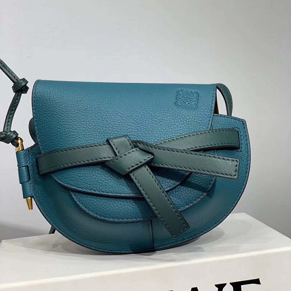 Close-up of knotted gold-tone hardware on Loewe Gate Mini Bag