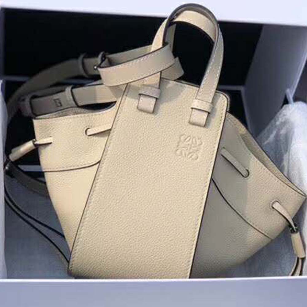 Close-up of gold embossed hardware on Loewe Women Hammock Dw Mini Bag