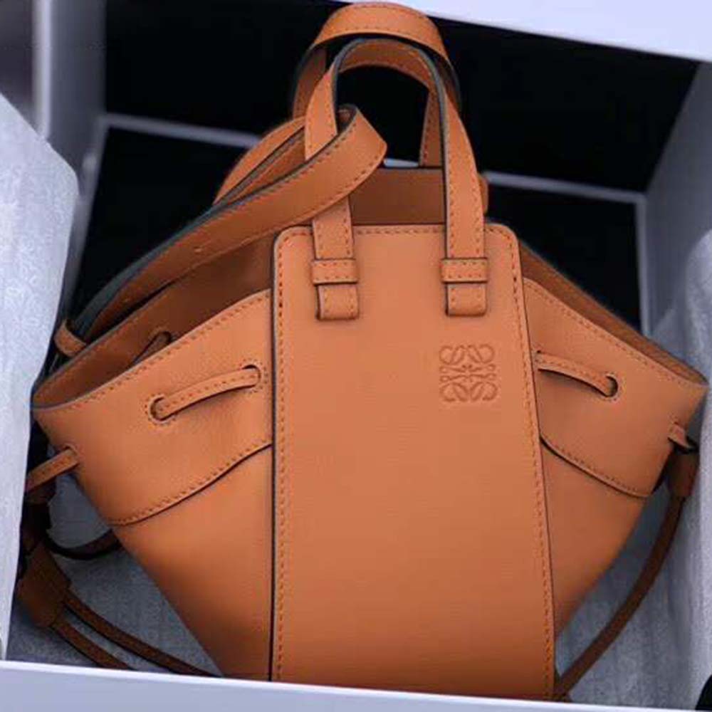 Close-up of gold-tone hardware and knotted leather details on Loewe Hammock bag