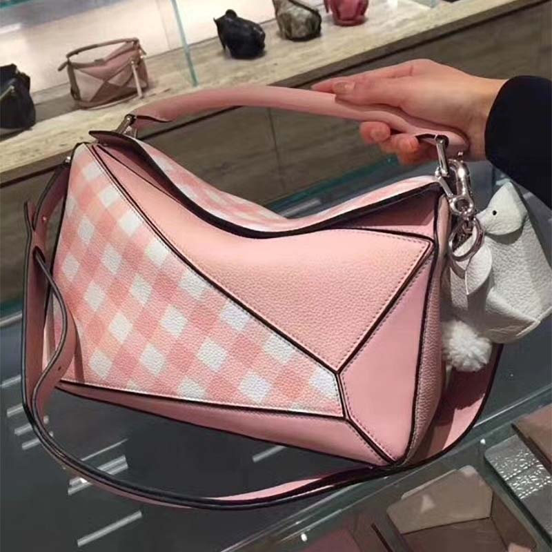Close-up detail of gingham pattern and silver hardware on the Loewe bag