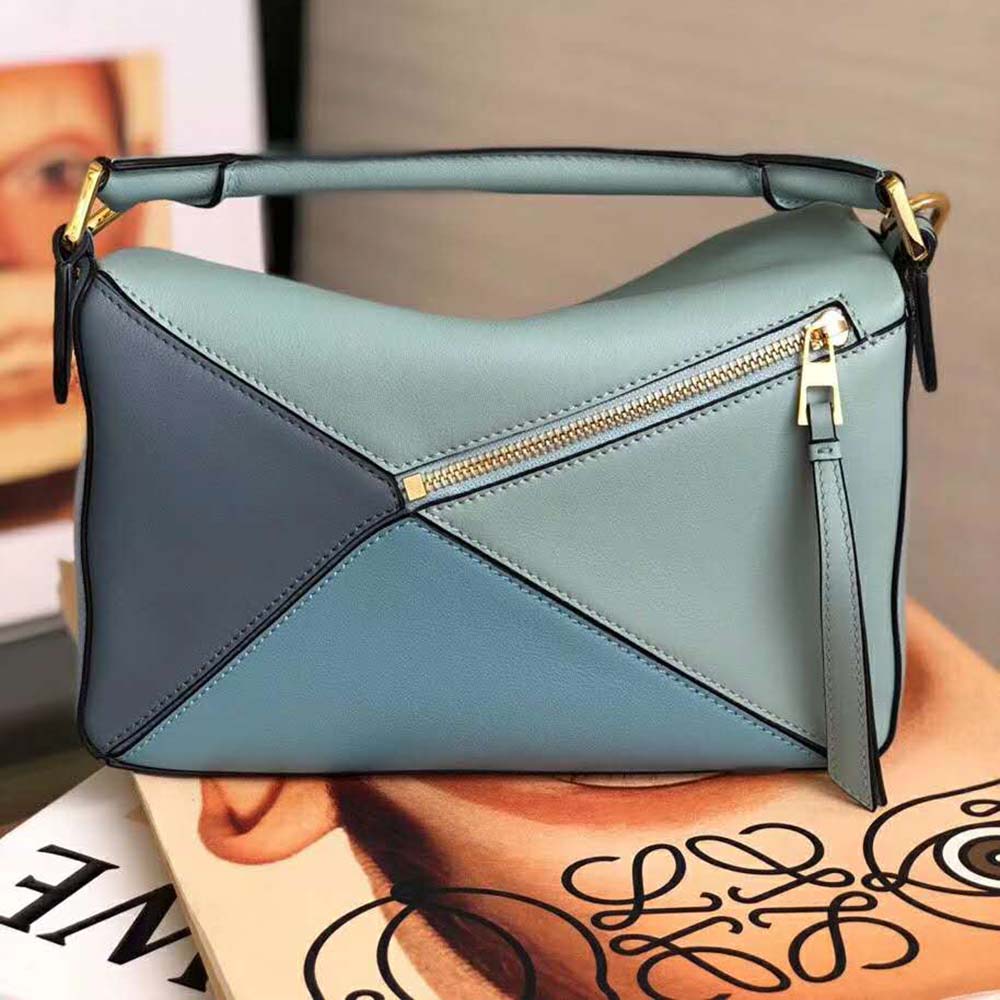 Close-up of geometric panels and silver hardware on Loewe Women Puzzle Small Bag