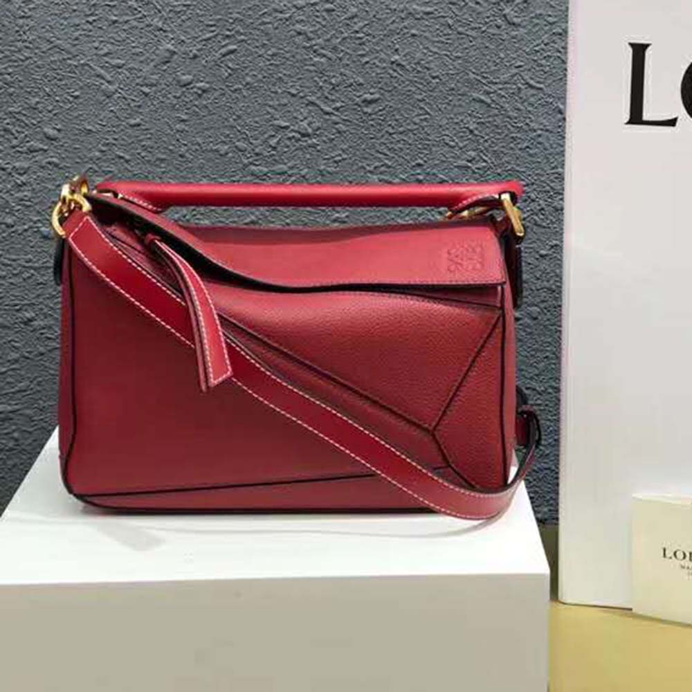 Side profile showing silhouette of Loewe Women Puzzle Small Bag in Red leather