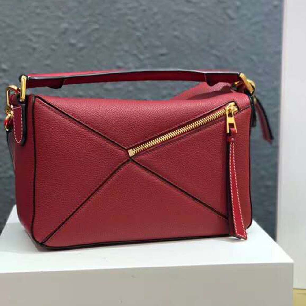 Close-up of silver hardware and stitching on Loewe Women Puzzle Small Bag