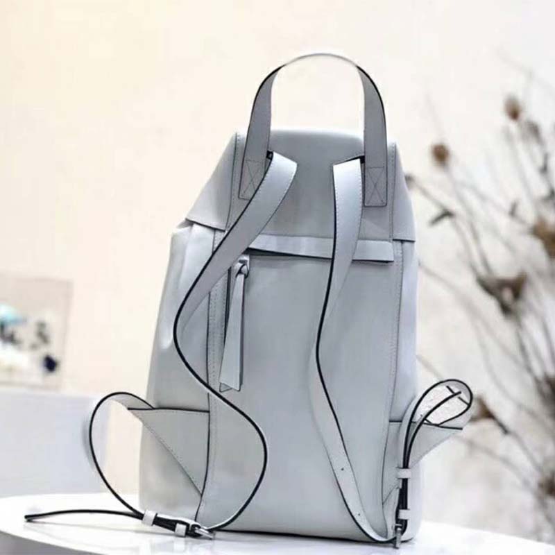 Close-up of silver-tone hardware detail on Loewe Women Rucksack Small Soft White
