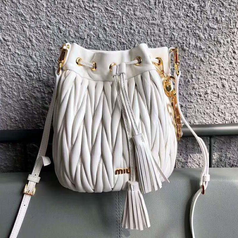 Close-up detail of the quilted leather on Miu Miu Women Matelasse Leather Bag-White
