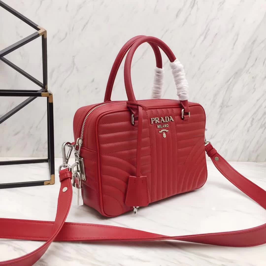 Side profile showing spacious silhouette of Prada Diagramme Big Leather Handbag