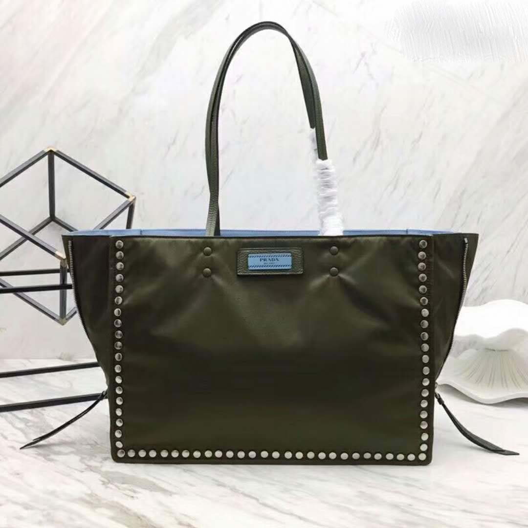Close-up of metal stud trim detailing on Prada Etiquette Fabric Tote