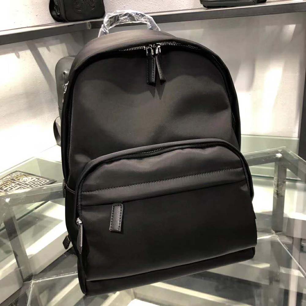Close-up on silver hardware and Saffiano leather detail backpack