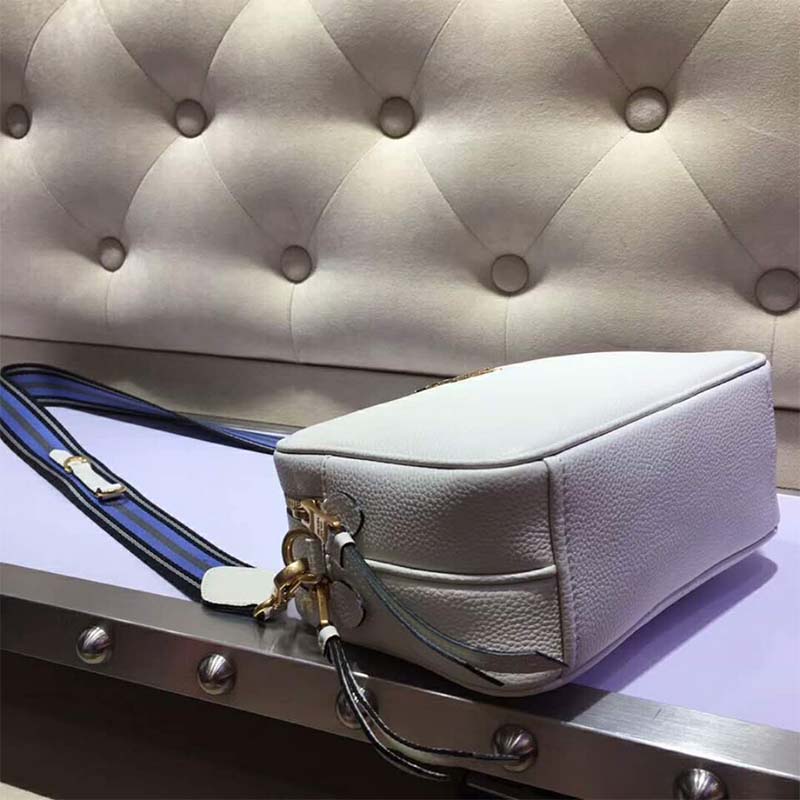 Side angle showing compact silhouette of Prada Women Calf Leather Shoulder Bag-White