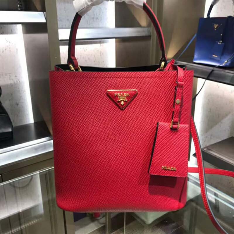 Close-up of gold-tone hardware and flap closure on Prada Women Double Medium Bag