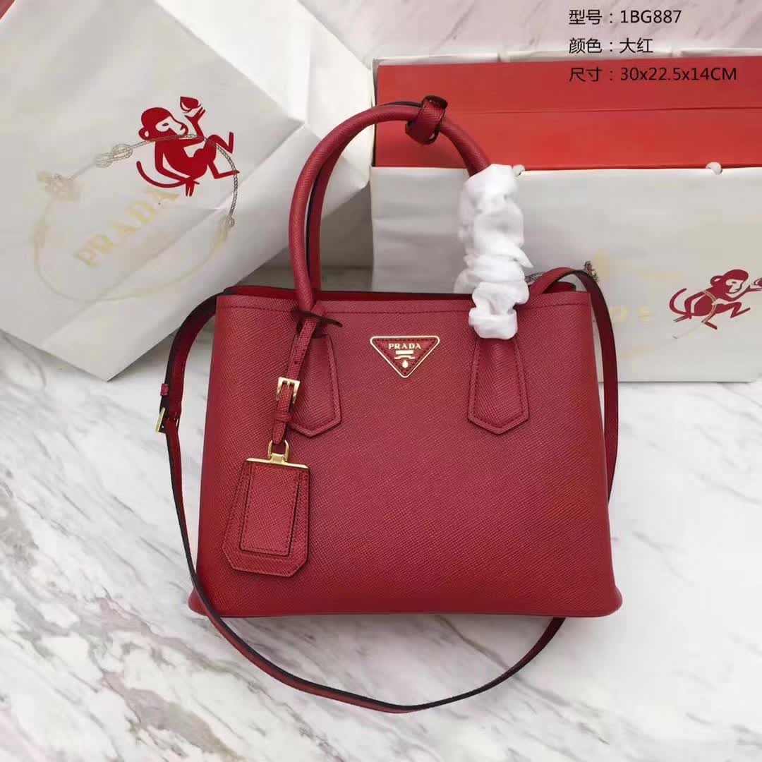 Close-up of textured saffiano leather on Prada Women Double Saffiano Leather Bag-Red