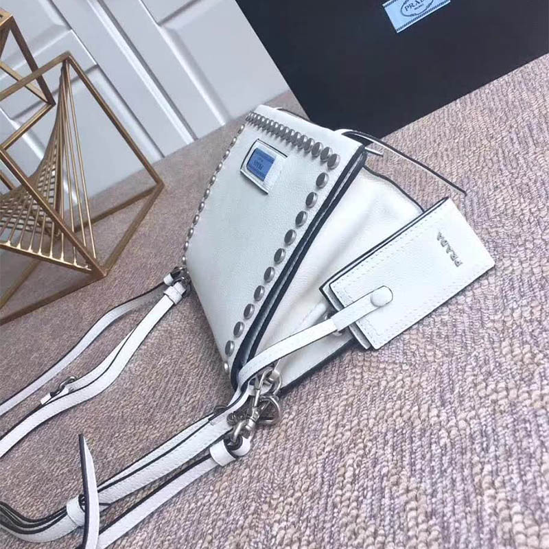 Side angle showing slim profile of Prada Women Etiquette Bag in Calf Leather-White
