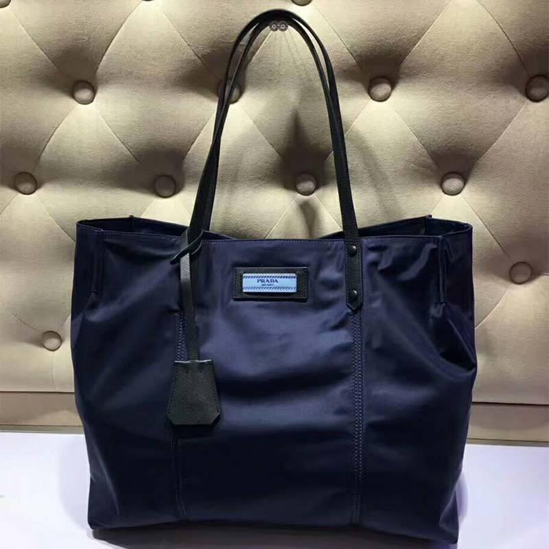 Close-up on zip closure and nylon texture of Prada Women Large Etiquette Nylon Bag-Black