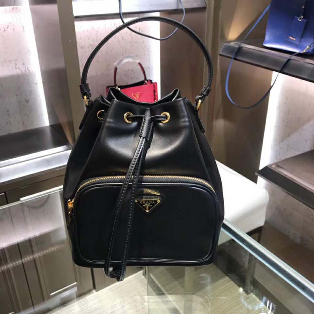 Side angle of Prada Women Leather Bucket Shoulder Bag showcasing silhouette