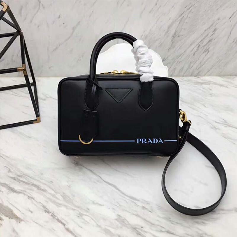 Close-up of silver-tone logo hardware on Prada Women Mirage Small Leather Bag-Black