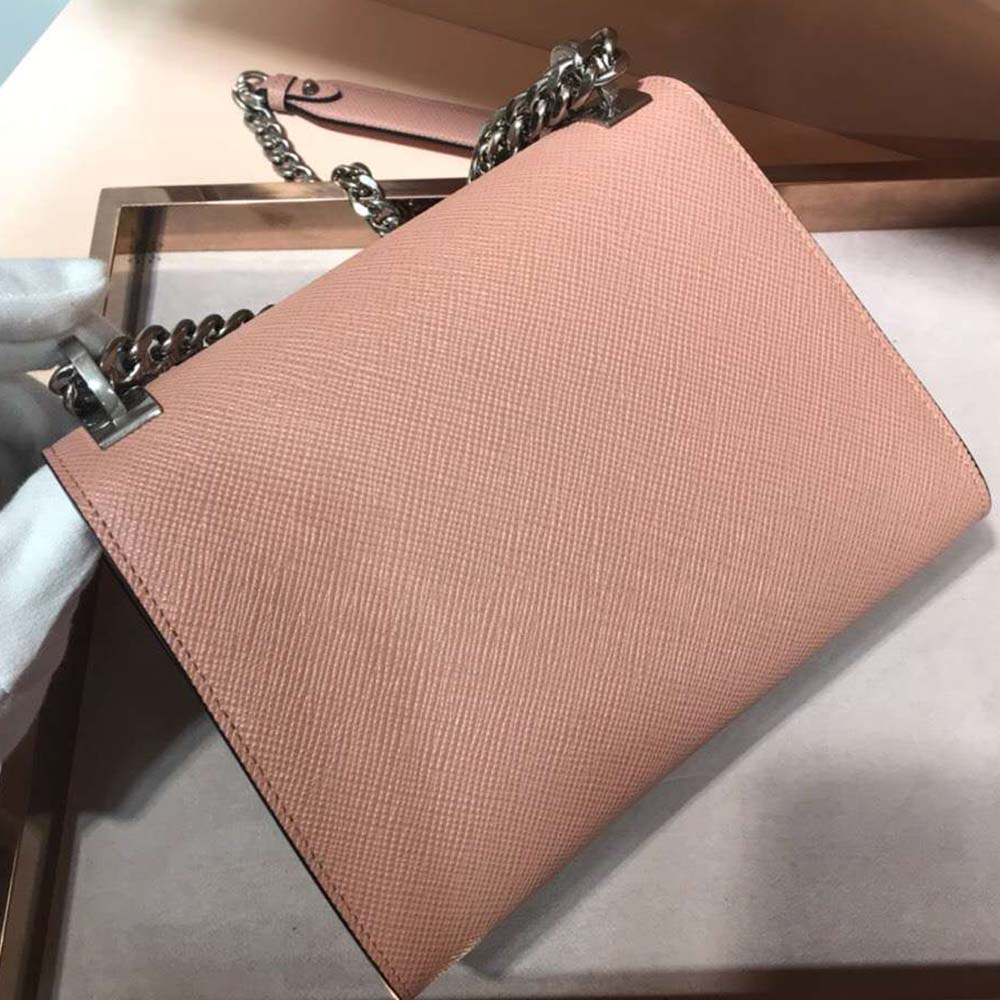 Side angle highlighting the structured silhouette of Prada Women Monochrome Saffiano Leather Bag-Pink