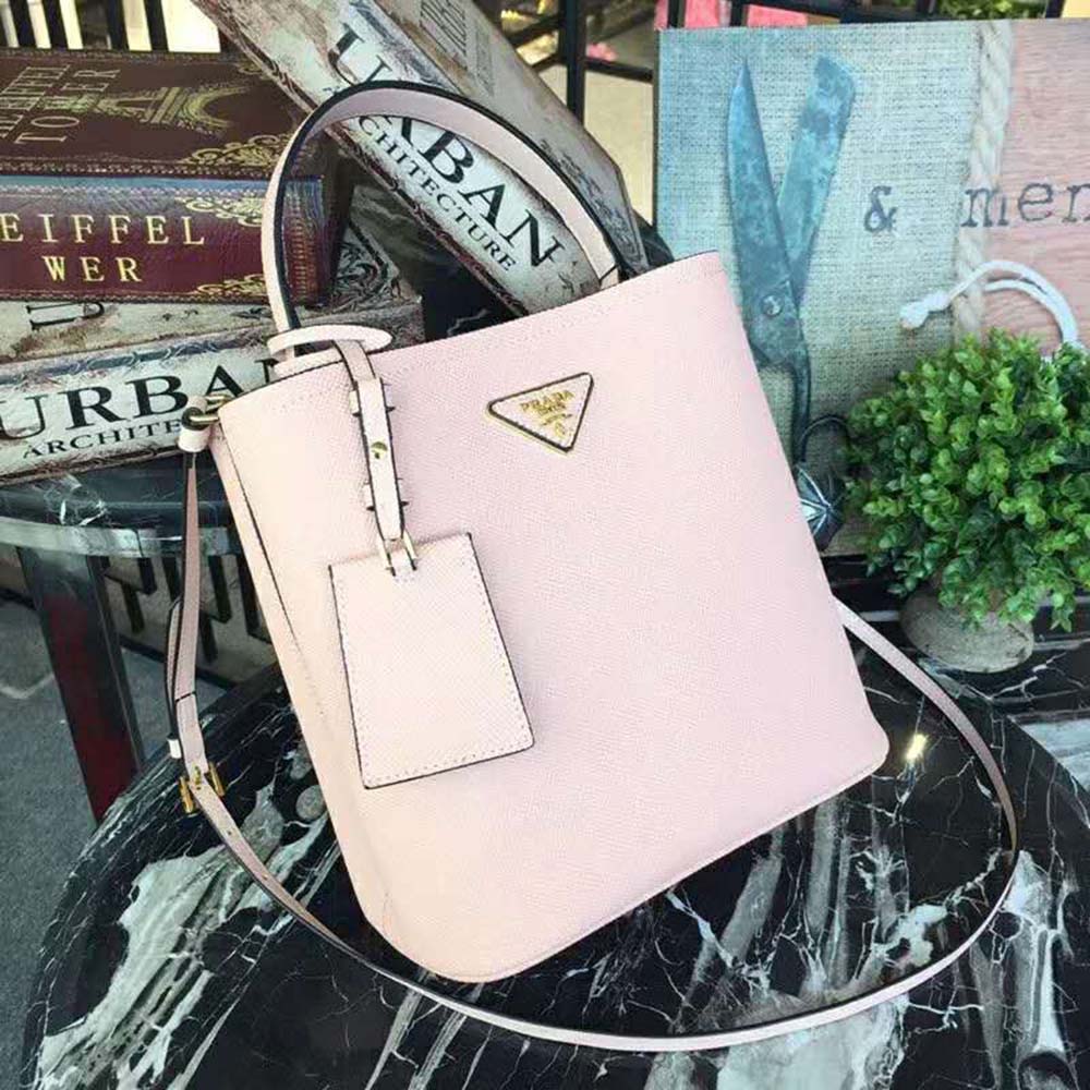 Close-up of Prada Women Panier Medium Bag white leather texture and logo