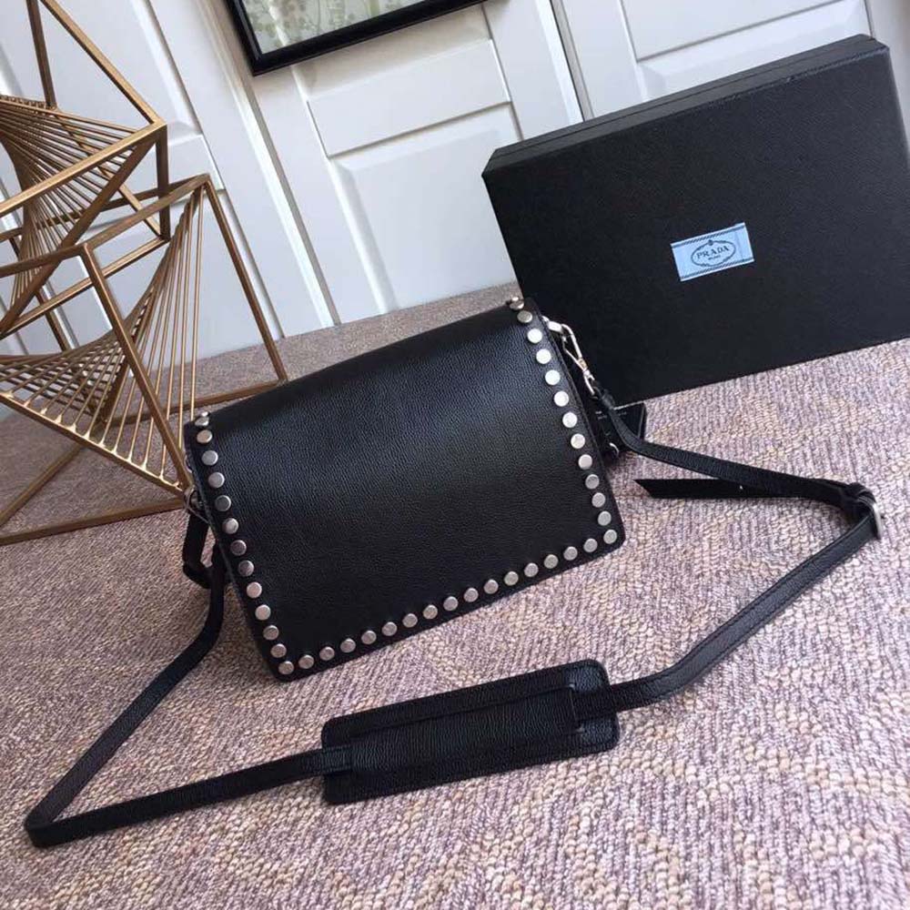 Side profile showing structured silhouette of Prada Women Prada Etiquette Bag-Black