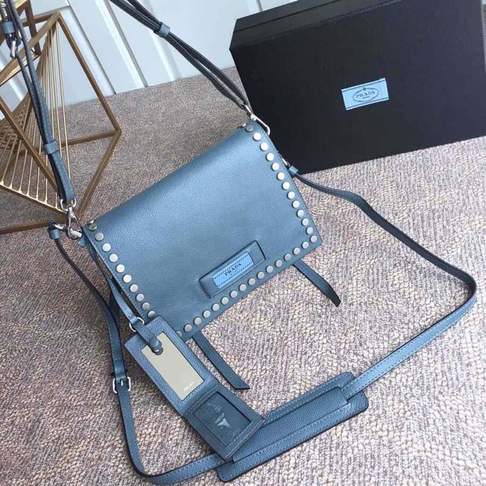 Side angle showing structured silhouette of Prada Women Prada Etiquette Bag-Blue