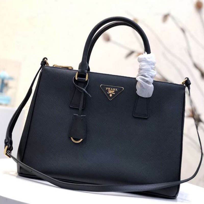Close-up of gold hardware on Prada Women Prada Galleria Bag