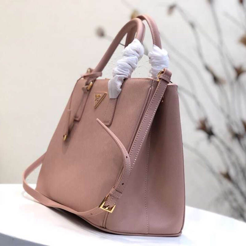 Side angle showing structured silhouette of Prada Women Prada Galleria Bag