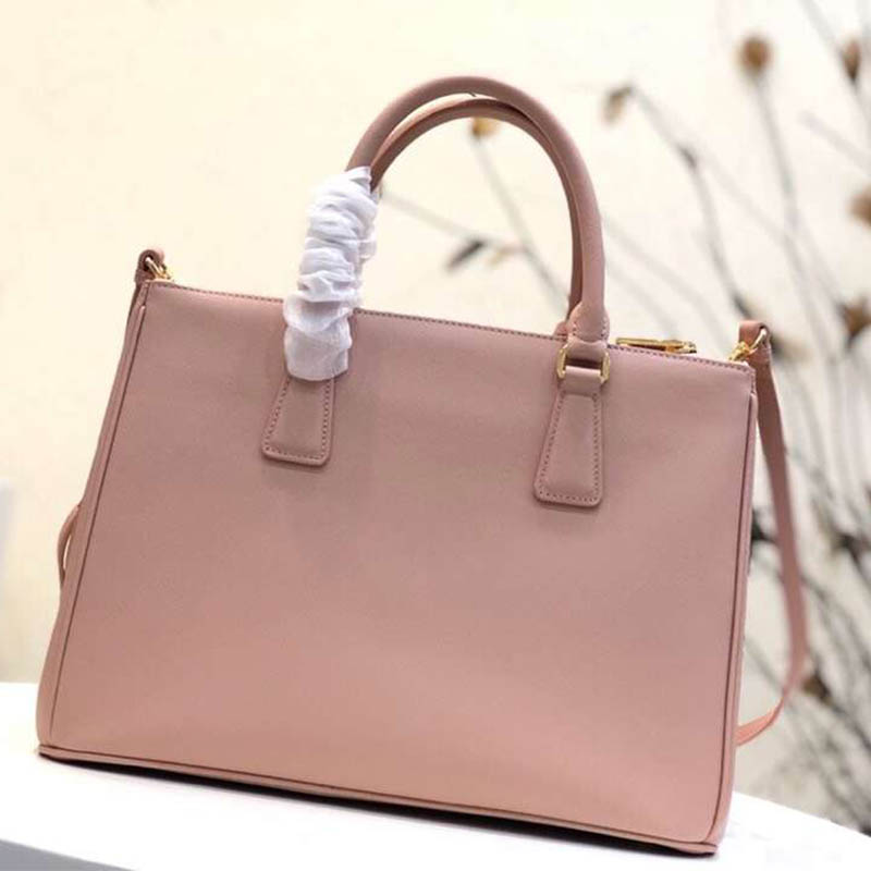Close-up of silver hardware and zip on Prada Women Prada Galleria Bag