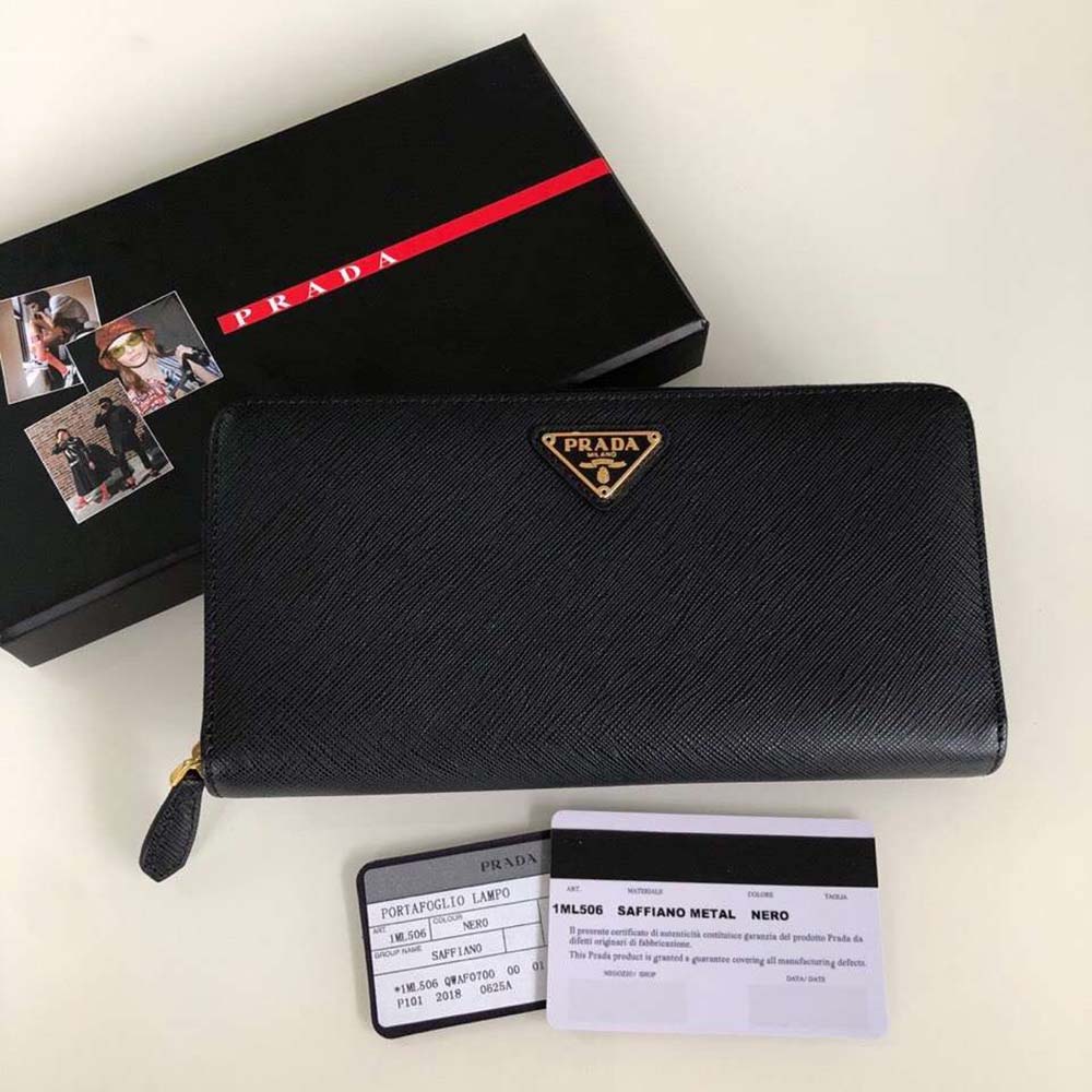 Close-up detail of Prada logo and gold hardware on mini bag