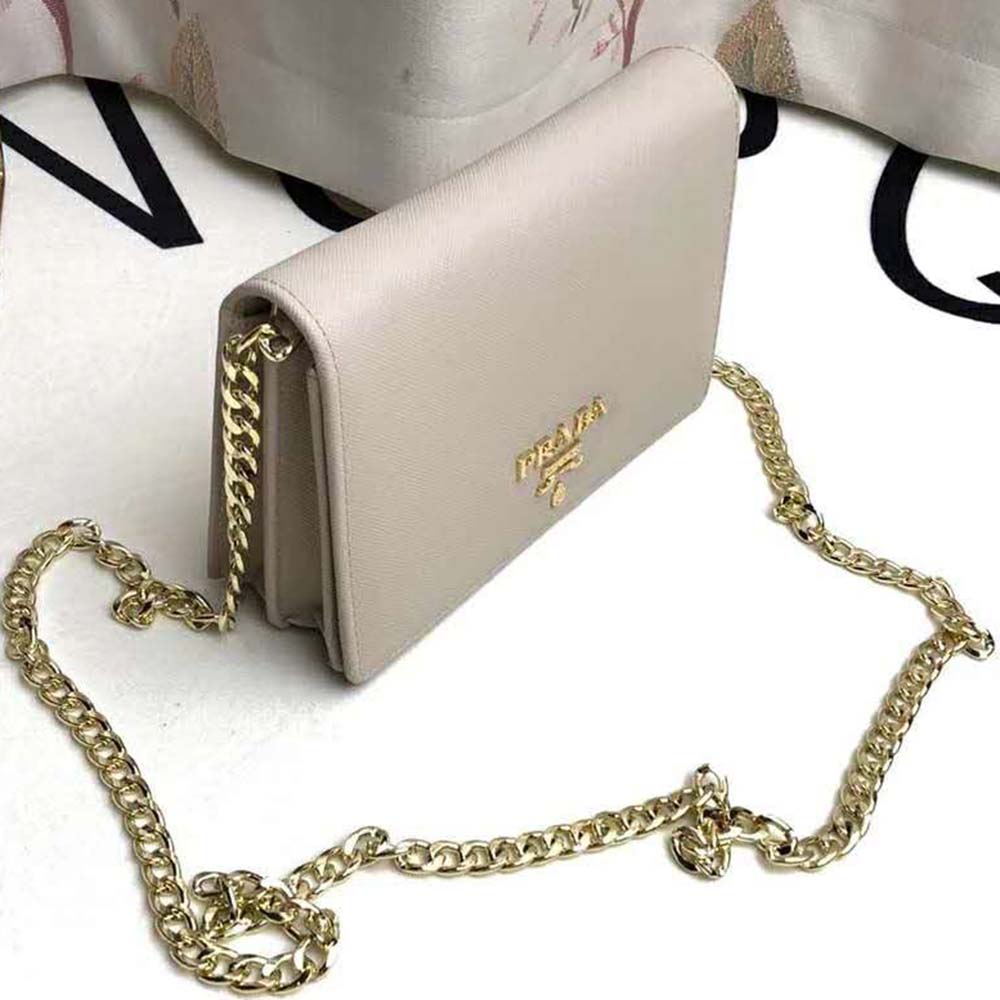 Side view highlighting adjustable strap on Prada Women Saffiano Leather Shoulder Bag-Beige