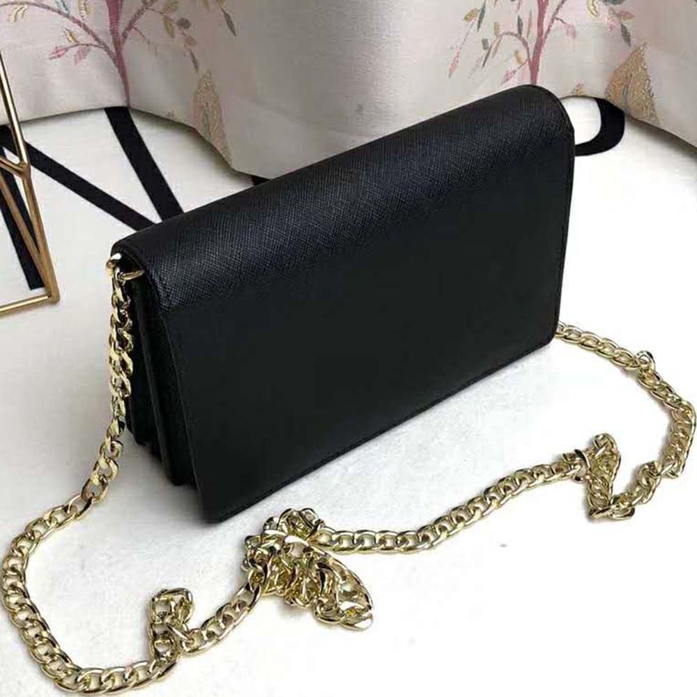 Side angle of Prada Women Saffiano Leather Shoulder Bag-Black with strap detail