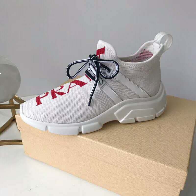 Overhead view highlighting lace-up closure on Prada Knit Sneakers