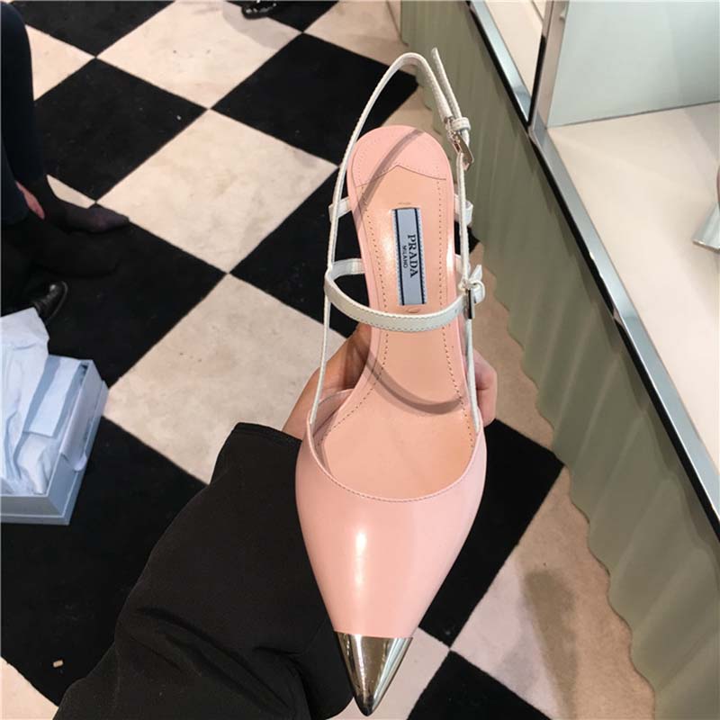 Front angle showing sleek pointy toe of Prada Women Two-Tone Pumps