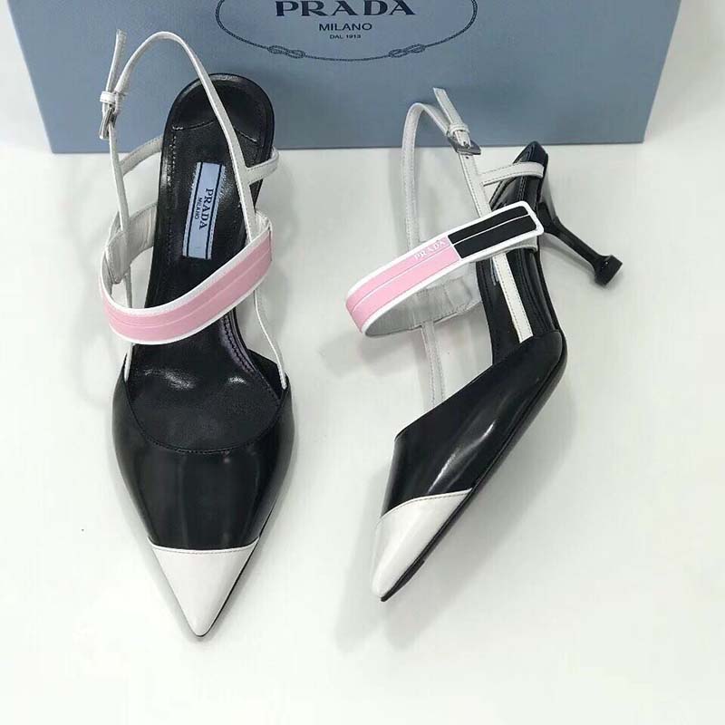 Close-up of gold-tone hardware detail on Prada Women Two-Tone Leather Slingbacks Shoes-Black