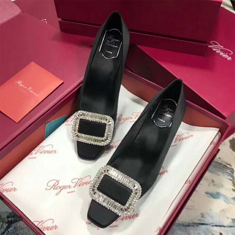 Close-up of silver buckle detail on Roger Vivier Belle Vivier Pumps